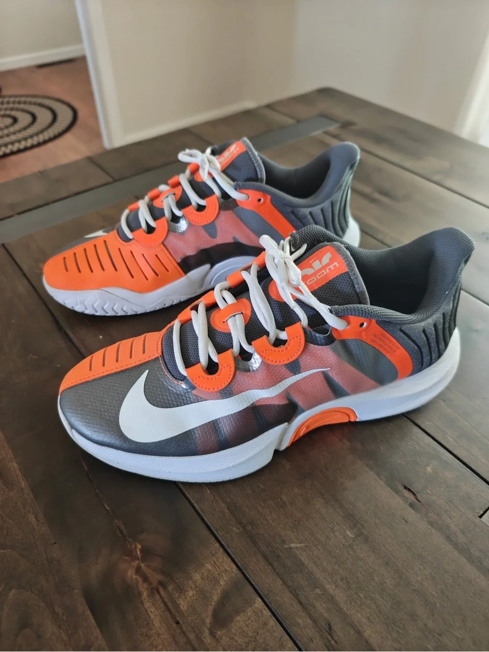 Nike Gray and Orange Athletic Sneakers with White Swoosh